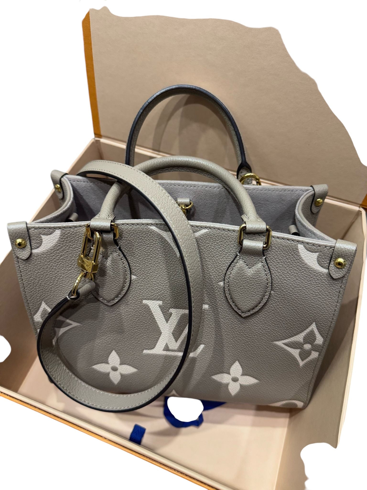 Louis Vuitton Onthego PM Dove/Cream Bicolor Monogram Empreinte Gold-tone Hardware