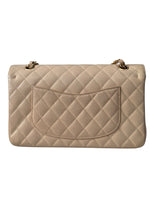 Load image into Gallery viewer, Beige quilted handbag on a white background
