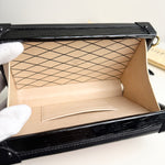 将图片加载到图库查看器，Black handbag with beige interior on a white background
