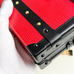 将图片加载到图库查看器，Red suitcase with black handle and gold accents on a white background
