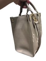 Load image into Gallery viewer, Louis Vuitton Onthego PM Dove/Cream Bicolor Monogram Empreinte Gold-tone Hardware
