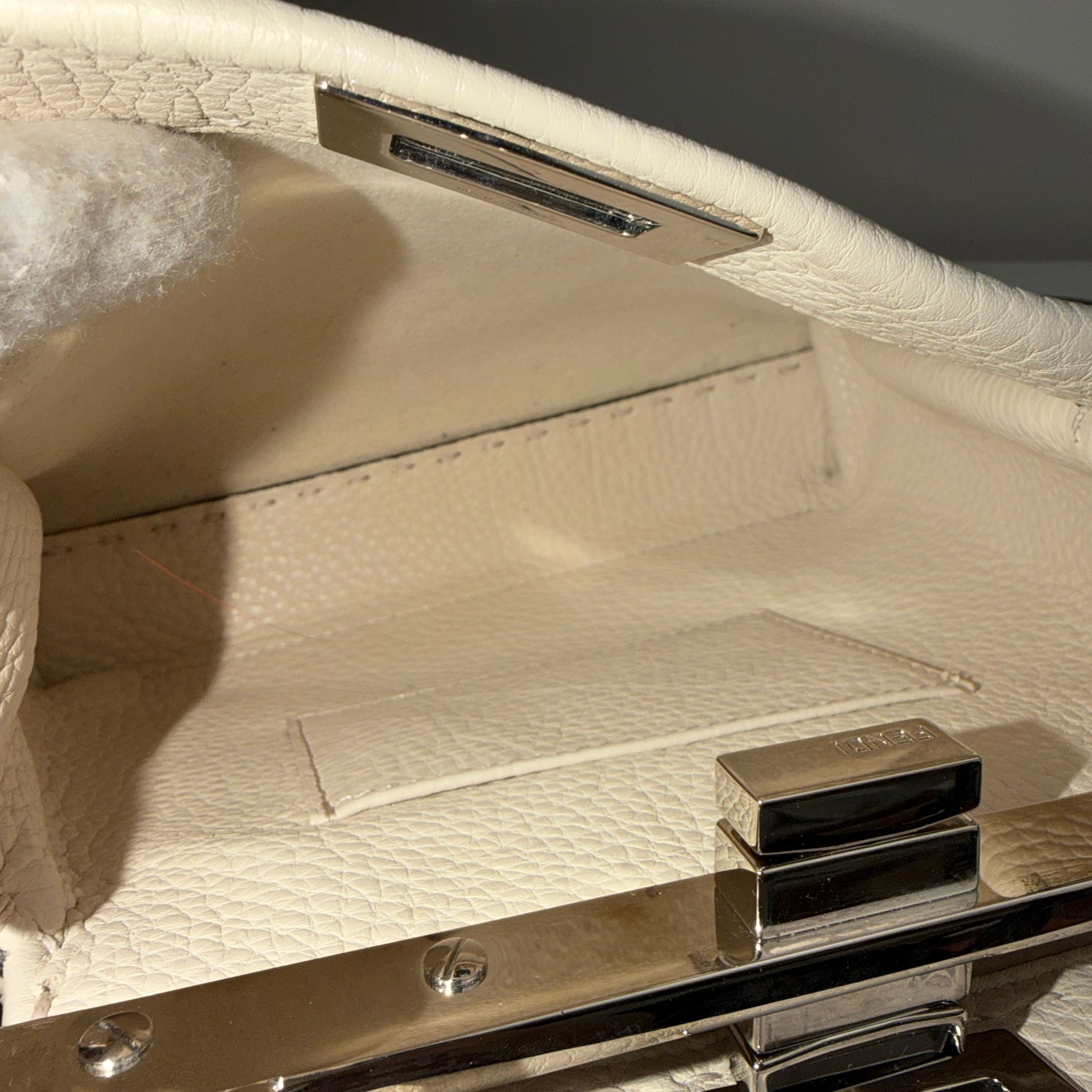 Close-up of a textured surface with metallic accents