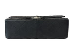 将图片加载到图库查看器，Black textured handbag on a white background
