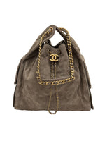 将图片加载到图库查看器，Brown handbag with gold chain and Chanel logo on a white background
