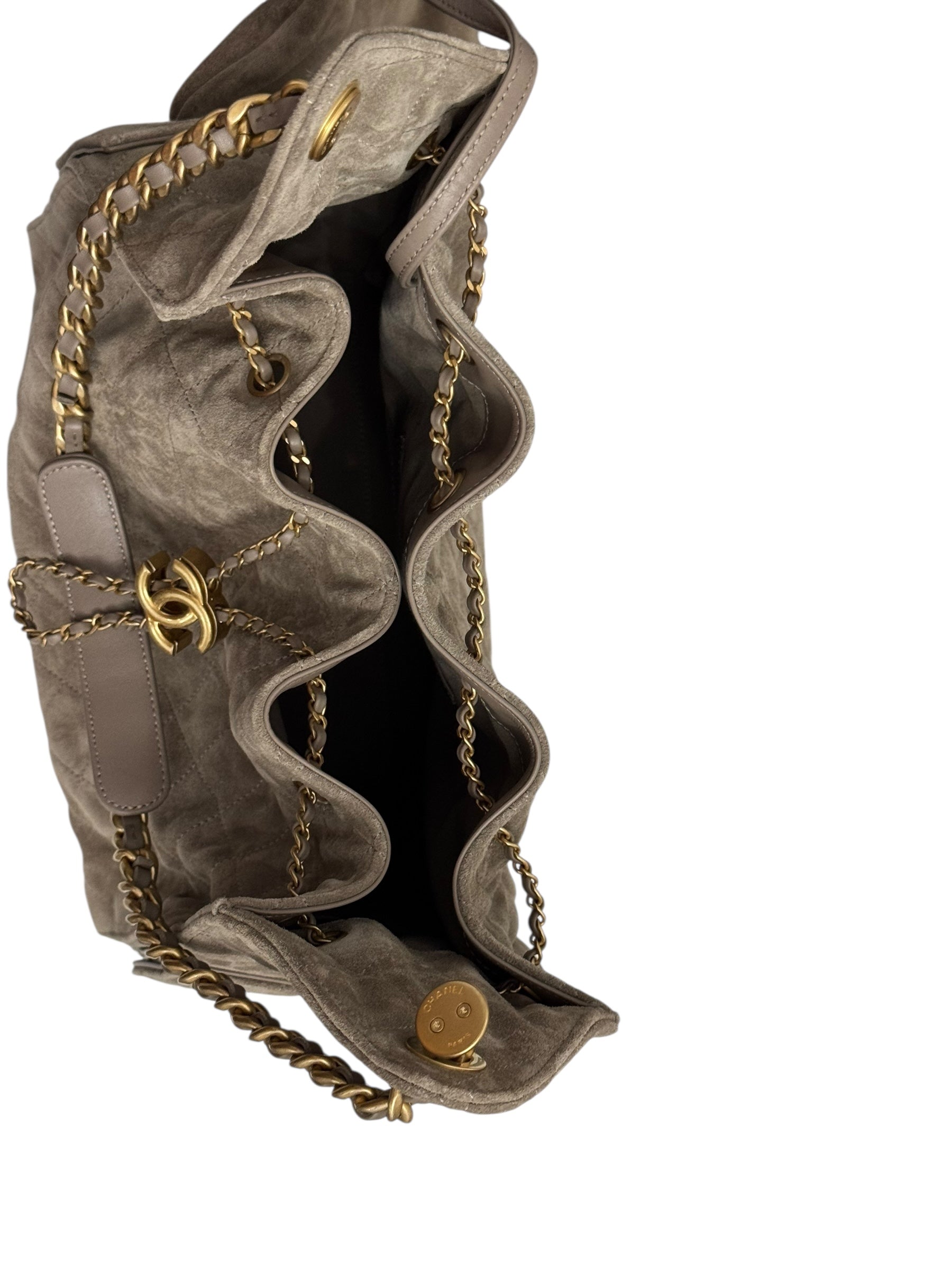 Open gray handbag with gold chain details on a white background