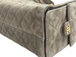 将图片加载到图库查看器，Close-up of a quilted gray handbag with a gold logo on a white background
