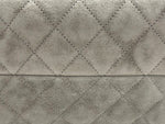 将图片加载到图库查看器，Close-up of textured quilted fabric with diamond pattern
