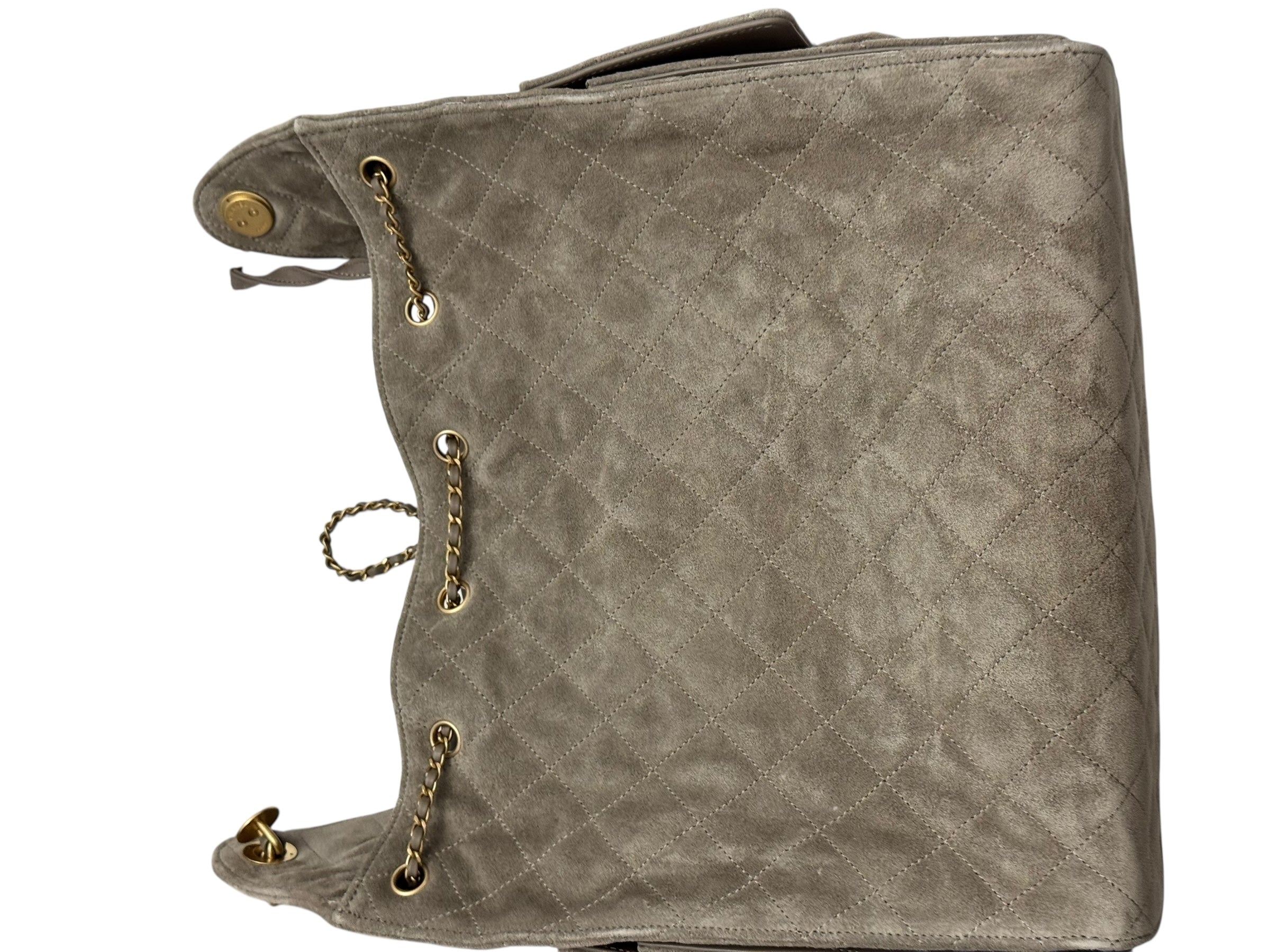 Brown leather book with gold accents on a white background