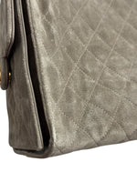 将图片加载到图库查看器，Close-up of a gray quilted handbag with a white background
