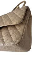 Load image into Gallery viewer, Beige handbag with a quilted design and gold chain handle on a white background
