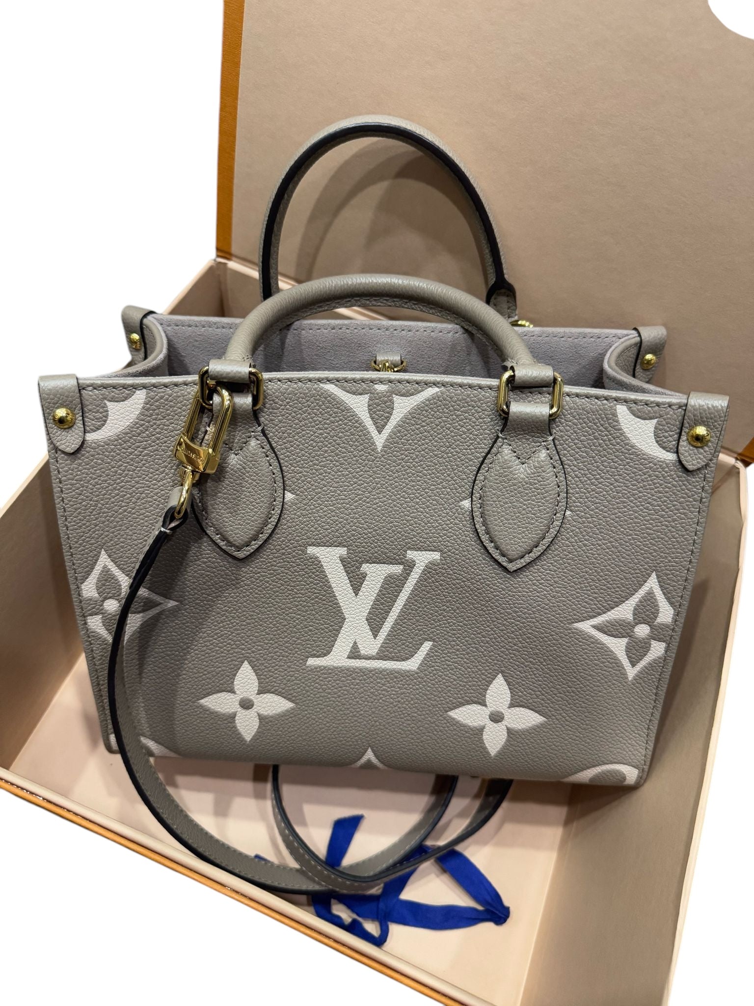 Louis Vuitton Onthego PM Dove/Cream Bicolor Monogram Empreinte Gold-tone Hardware