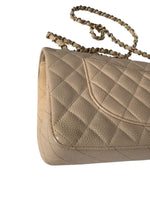 Load image into Gallery viewer, Beige quilted handbag with a gold chain strap on a white background
