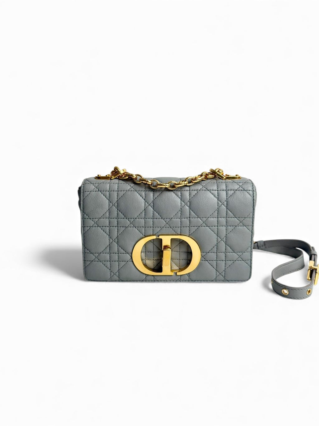 Gray quilted handbag with gold chain and logo on a white background