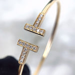 Load image into Gallery viewer, Tiffany &amp; Co. T Wire Diamond Bracelet
