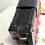 将图片加载到图库查看器，Close-up of a black leather wallet with gold accents on a white background
