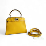 将图片加载到图库查看器，Yellow handbag with matching strap on a white background
