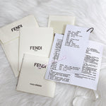 将图片加载到图库查看器，Fendi documents and packaging on a white surface
