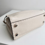 将图片加载到图库查看器，Beige leather clutch bag with silver accents on a white surface
