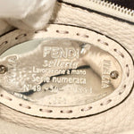 将图片加载到图库查看器，Fendi label on a beige leather product with &#39;FENDI&#39; and &#39;ROMA&#39; branding.

