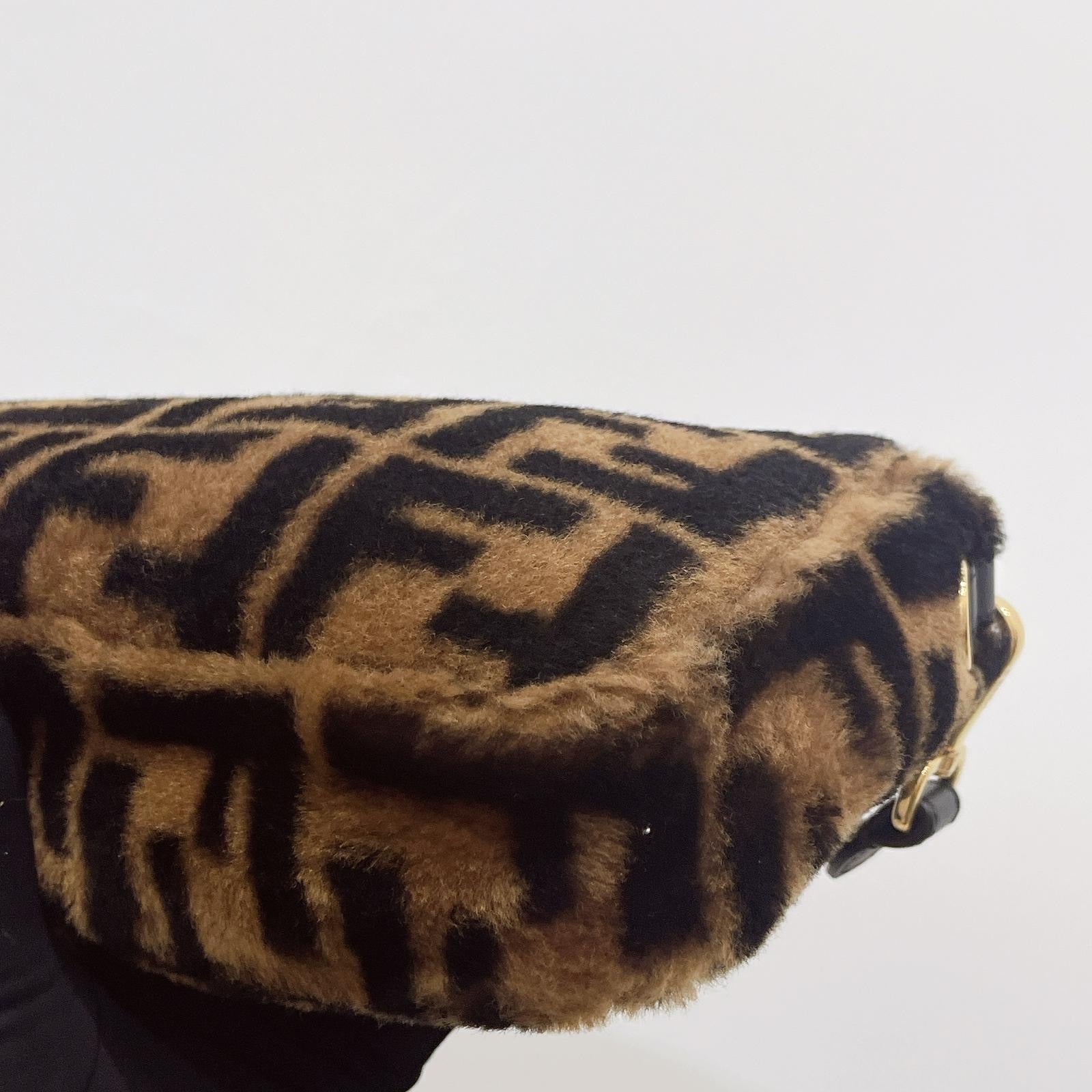 Fur beret with a pattern on a white background