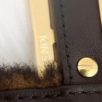 将图片加载到图库查看器，Close-up of a black leather product with gold hardware and &#39;Fendi&#39; branding.
