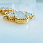 Load image into Gallery viewer, Van Cleef and Arpels Vintage Alhambra Bracelet, 5 Motifs, 18K Yellow Gold, Mother of Pearl
