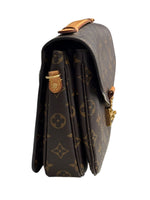 Load image into Gallery viewer, Designer handbag with monogram pattern on a white background
