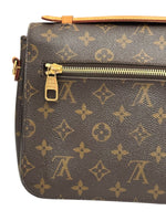 Load image into Gallery viewer, Louis Vuitton monogram handbag with gold zipper on a white background
