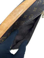 Load image into Gallery viewer, Louis Vuitton handbag with monogram pattern and visible brand logo.
