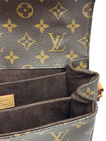 Load image into Gallery viewer, Close-up of a Louis Vuitton handbag with monogram pattern
