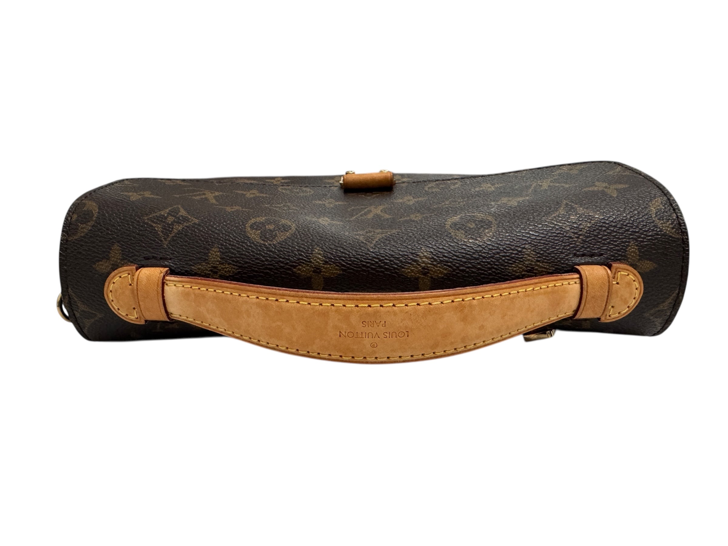 Designer handbag with monogram pattern on a white background