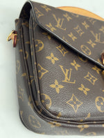 Load image into Gallery viewer, Brown leather handbag with gold monogram pattern on a white background
