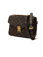 Load image into Gallery viewer, Designer handbag with monogram pattern on a white background
