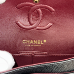 Charger l&#39;image dans la galerie, Close-up of a Chanel handbag with the brand logo and &#39;Made in France&#39; text.

