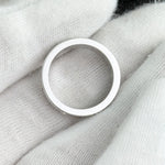 将图片加载到图库查看器，Silver ring on a textured white fabric background
