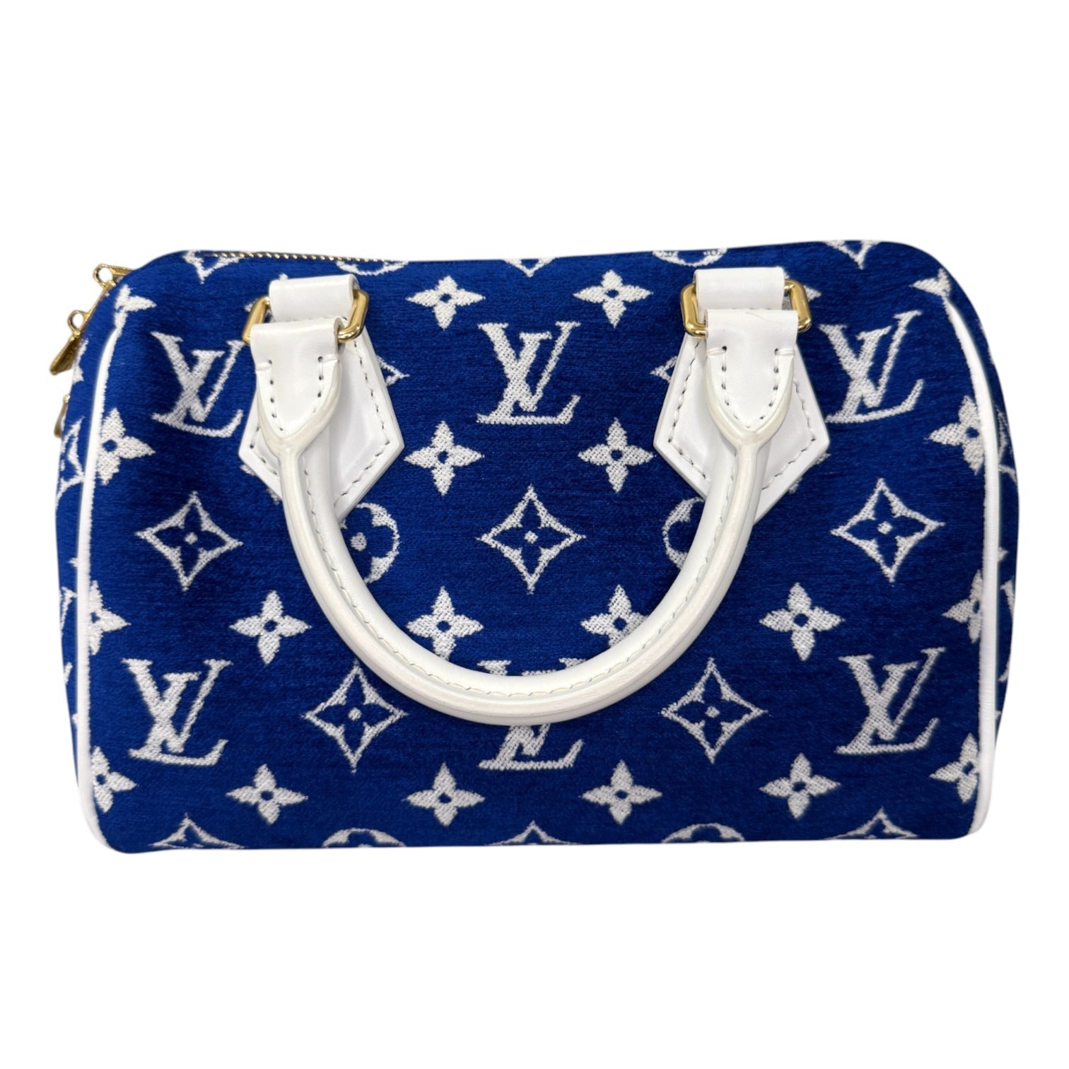 Blue handbag with white monogram pattern on a white background