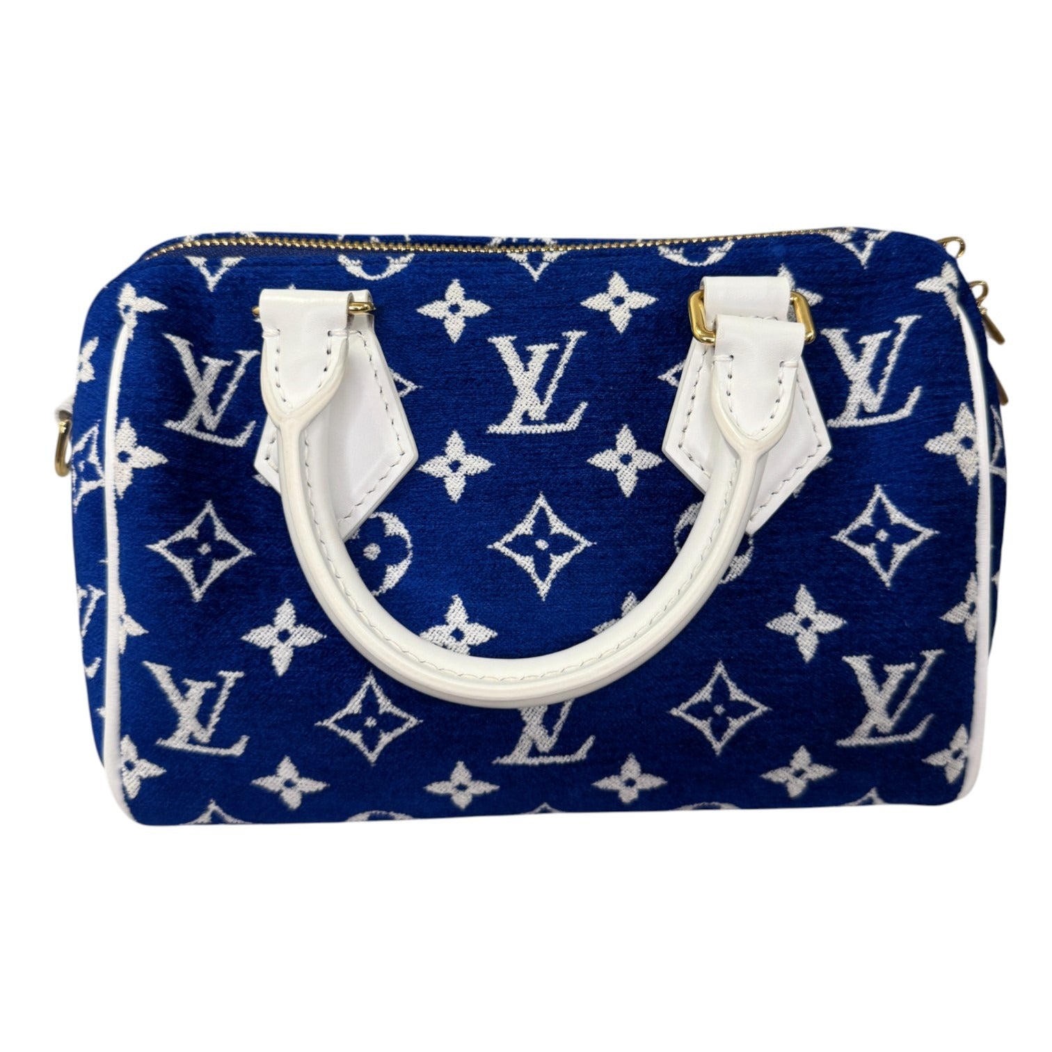 Blue handbag with white monogram pattern on a white background
