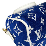 将图片加载到图库查看器，Blue pouch with white monogram pattern on a white background
