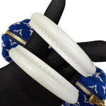 将图片加载到图库查看器，White leather dog collars with blue and black patterned pouches on a white background
