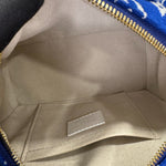 将图片加载到图库查看器，Close-up of a beige interior of a bag with a visible brand label.
