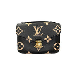Charger l&#39;image dans la galerie, Black handbag with gold monogram pattern on a white background
