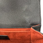 Charger l&#39;image dans la galerie, Close-up of a black leather product with a red interior on a white background
