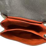 Charger l&#39;image dans la galerie, Close-up of a leather bag with a gray exterior and red interior.
