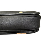 Charger l&#39;image dans la galerie, Close-up of a black leather suitcase handle on a white background
