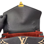 Charger l&#39;image dans la galerie, Close-up of a black leather handbag with gold accents, featuring the Louis Vuitton logo.
