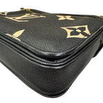 Charger l&#39;image dans la galerie, Black leather case with gold monogram pattern on a white background
