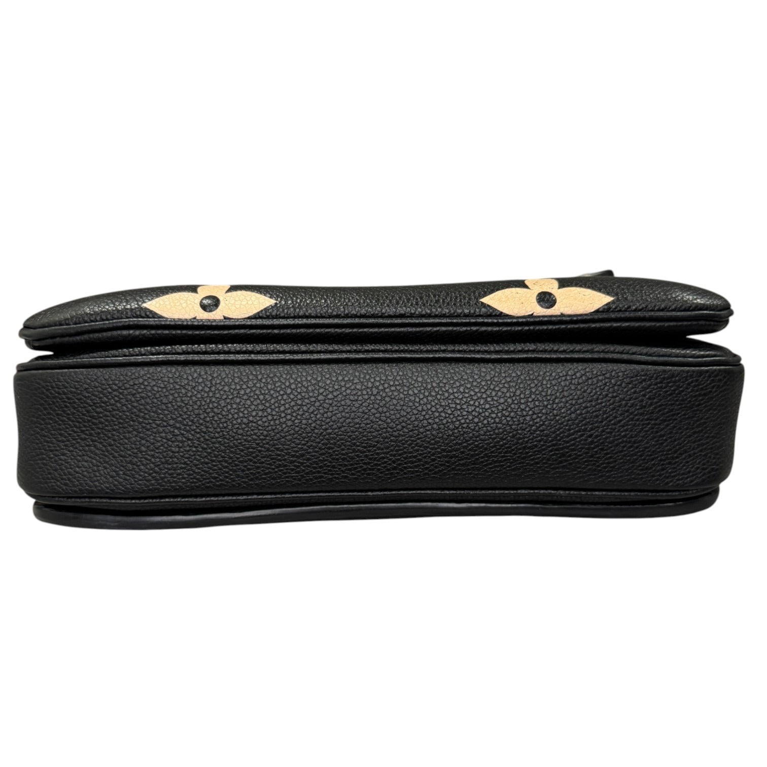Black leather clutch with gold accents on a white background