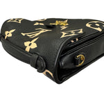 Charger l&#39;image dans la galerie, Black leather wallet with gold floral patterns on a white background
