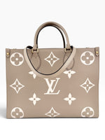 Load image into Gallery viewer, Louis Vuitton LV OnTheGo MM Tote Empreinte Leather Beige/Cream
