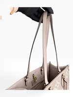 Load image into Gallery viewer, Louis Vuitton LV OnTheGo MM Tote Empreinte Leather Beige/Cream
